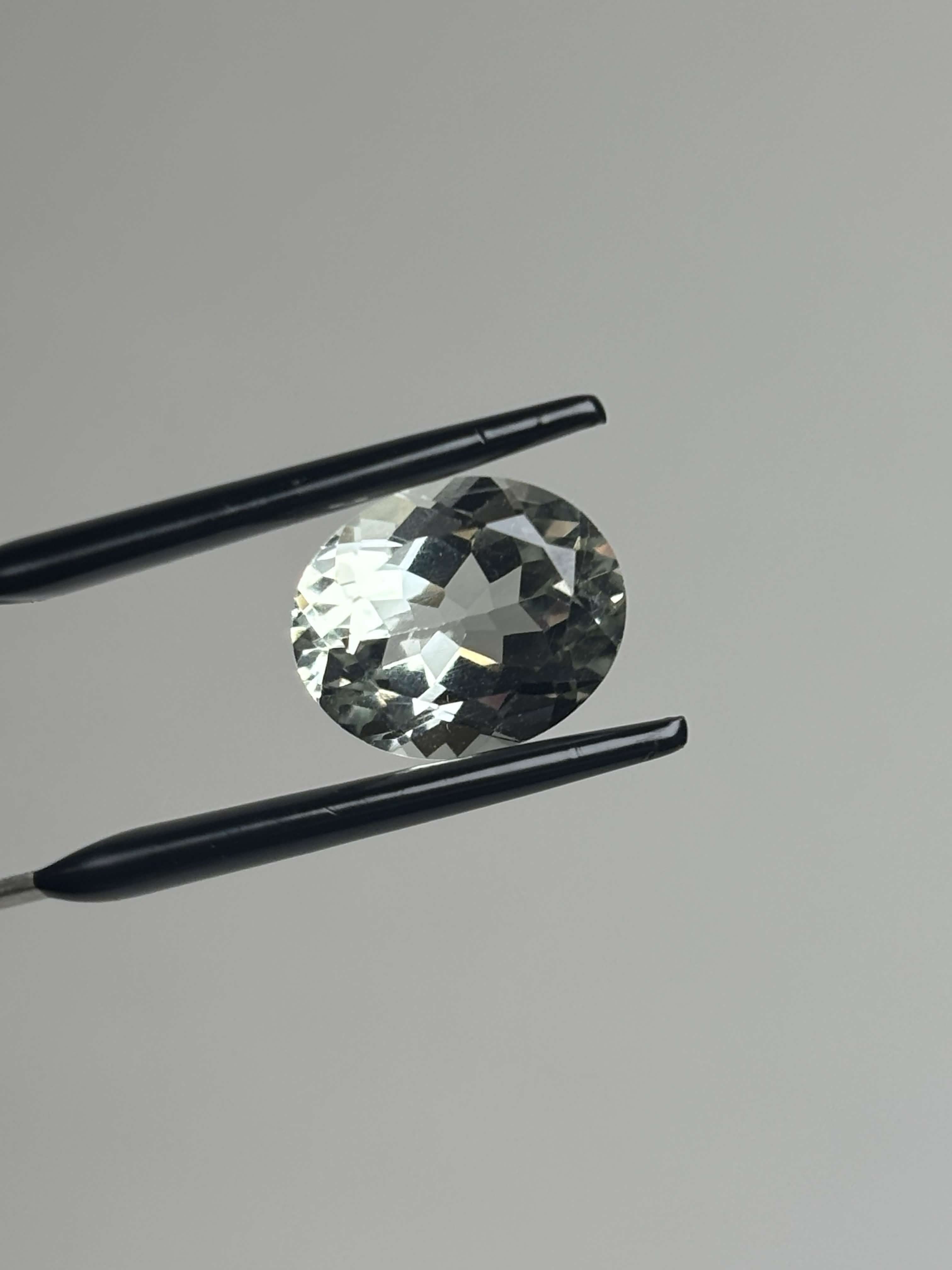 Front of pale green faceted stone