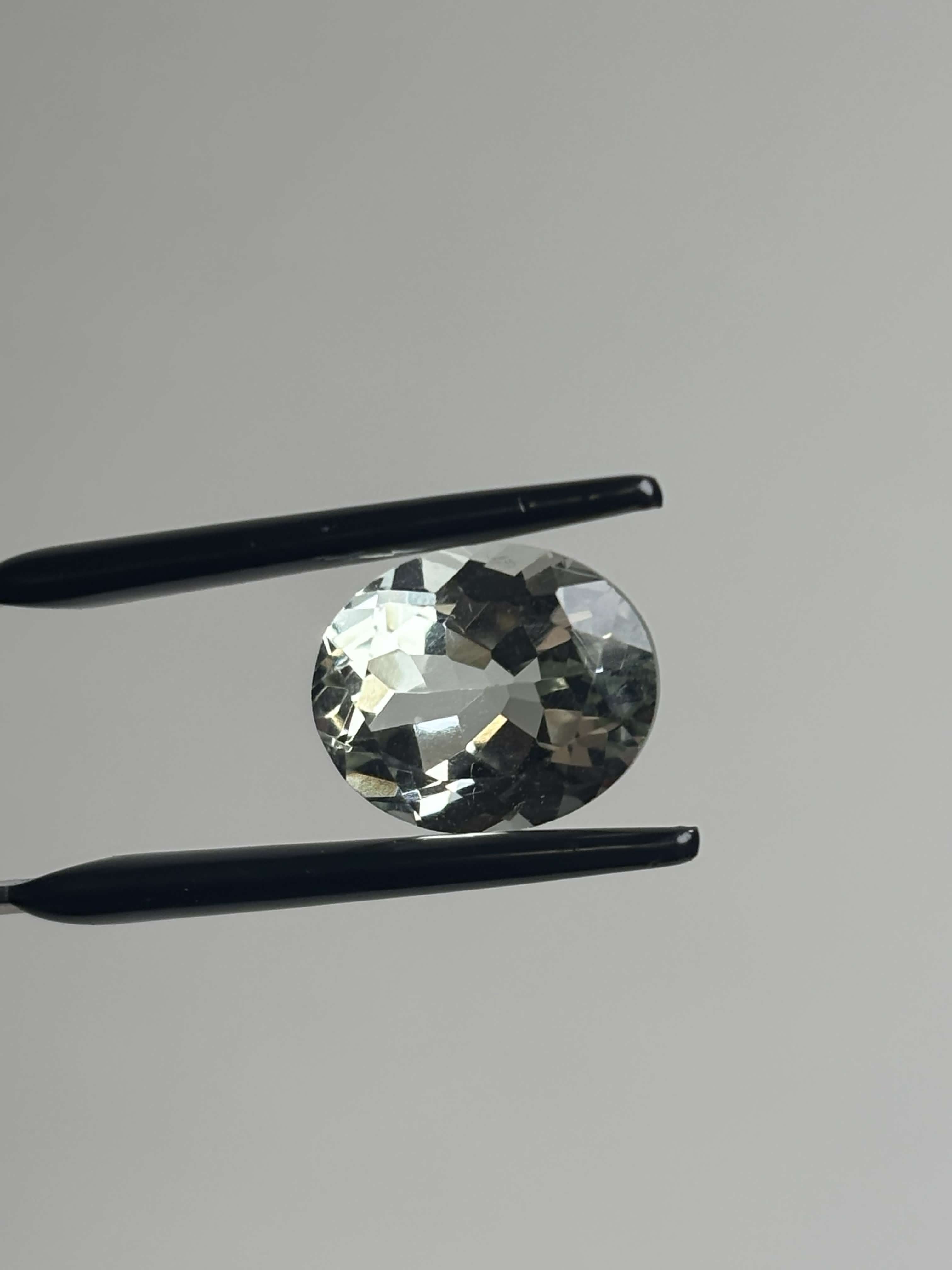 Front of pale green faceted stone