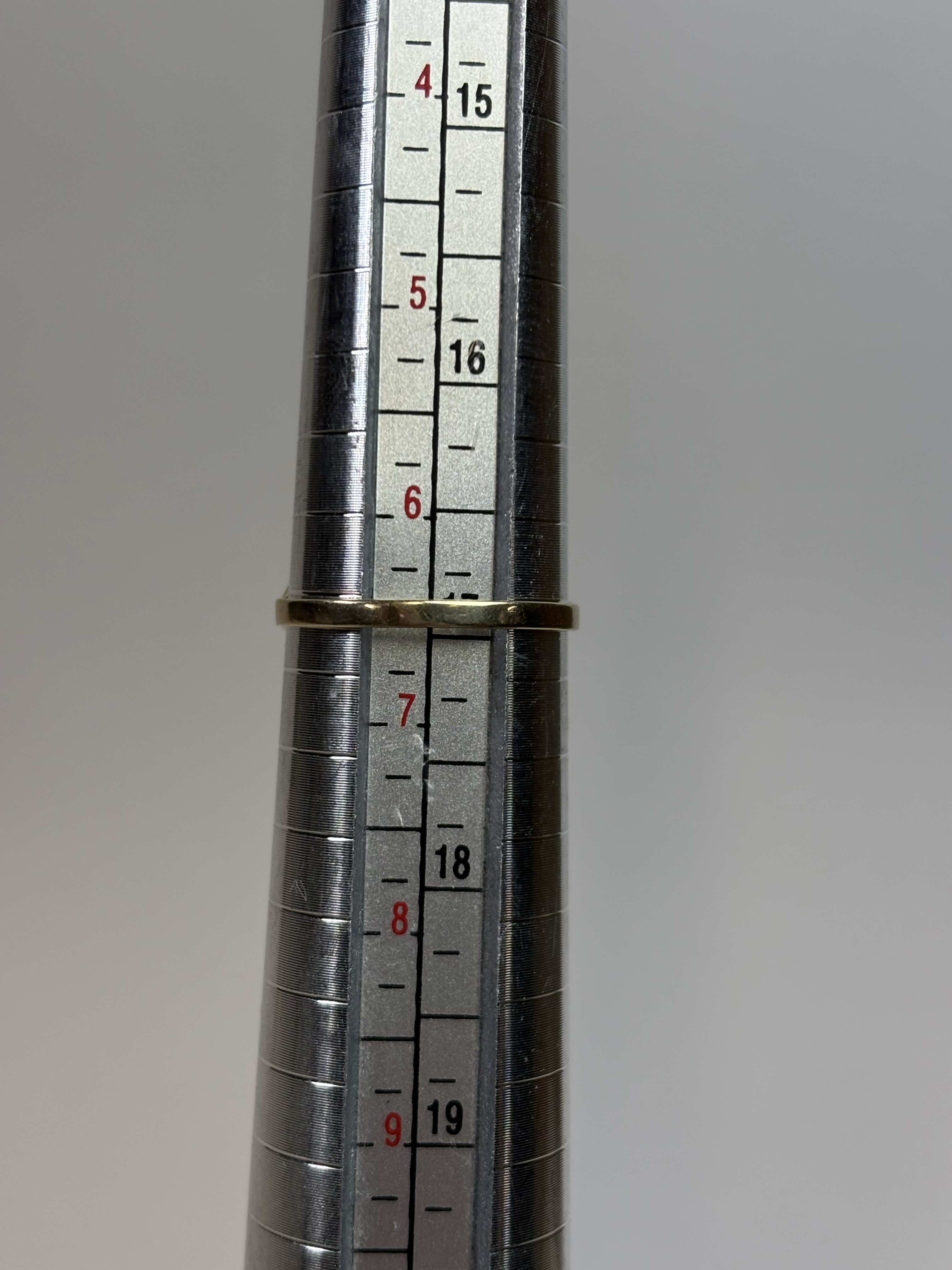 Yellow Gold Filigree Wave Ring showing size